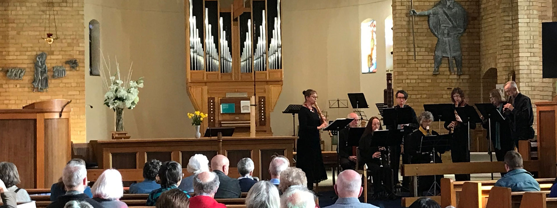 Parishioners playing music as part of a church service